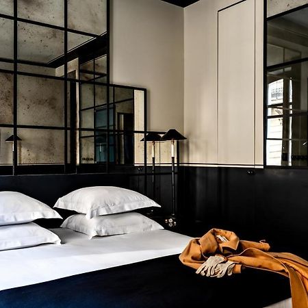 Monsieur George Hotel&Spa - Champs-Elysées Paris Extérieur photo A room at the Hotel 57