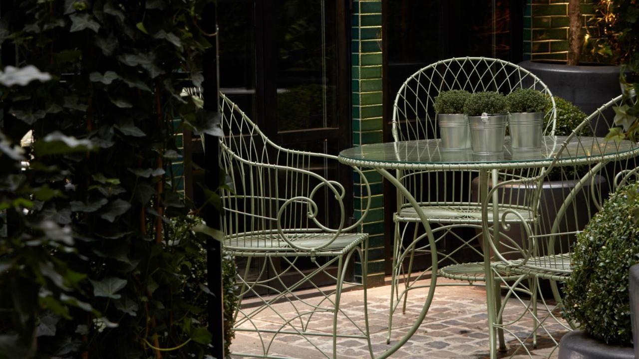 Monsieur George Hotel&Spa - Champs-Elysées Paris Extérieur photo A patio in Madrid